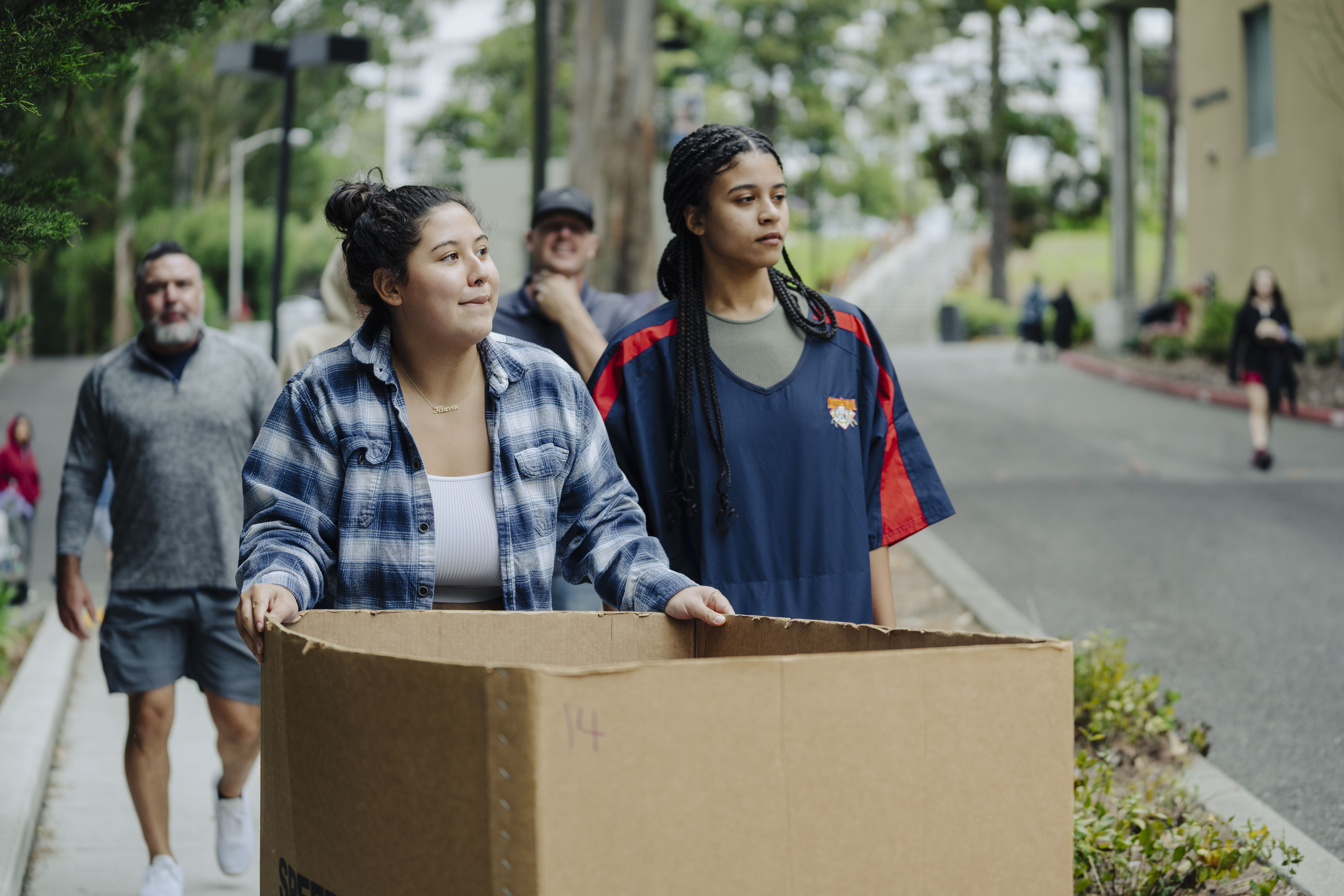 Student moving belongings on move-in day