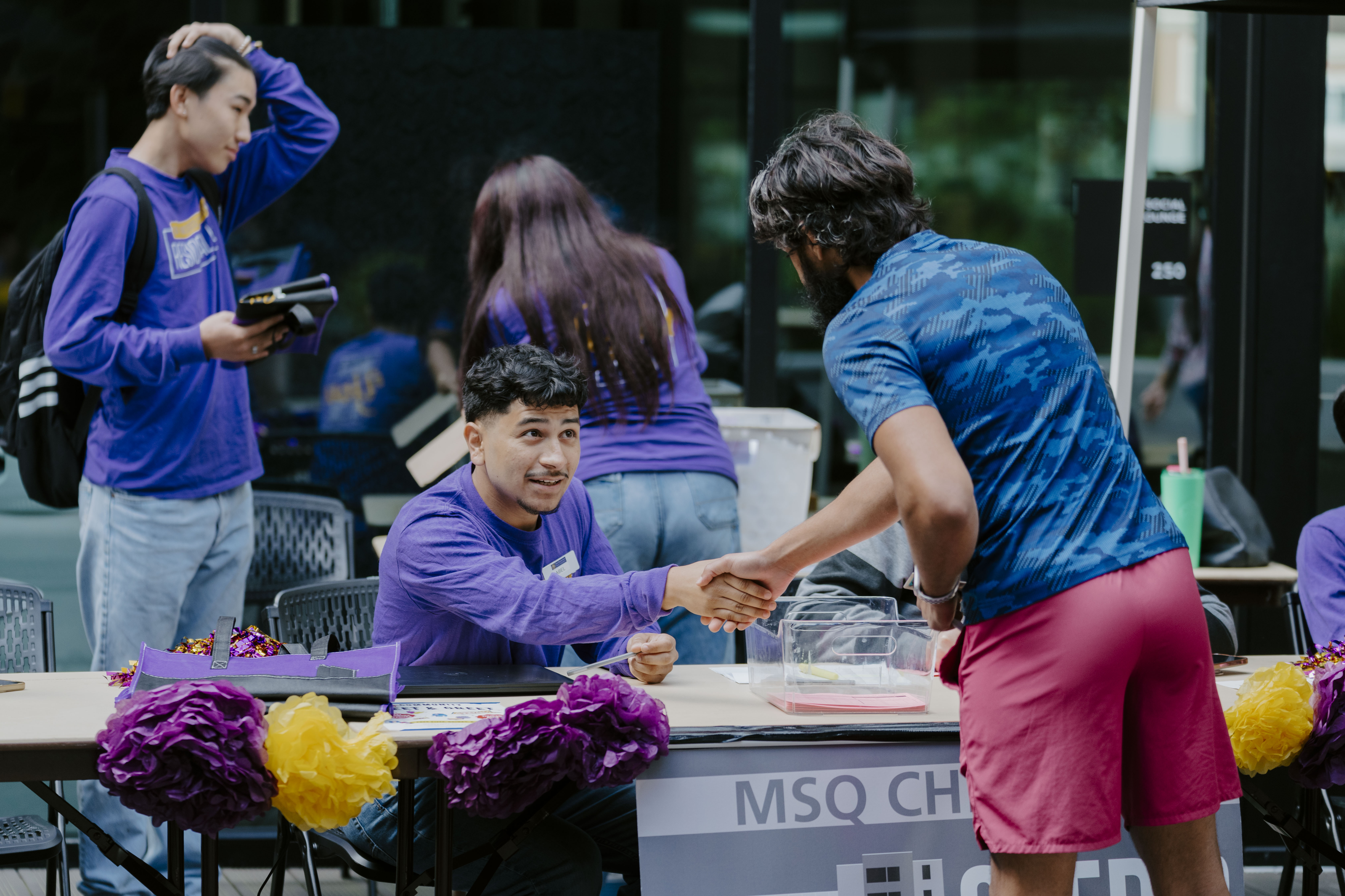 Student at check-in table at Move-in