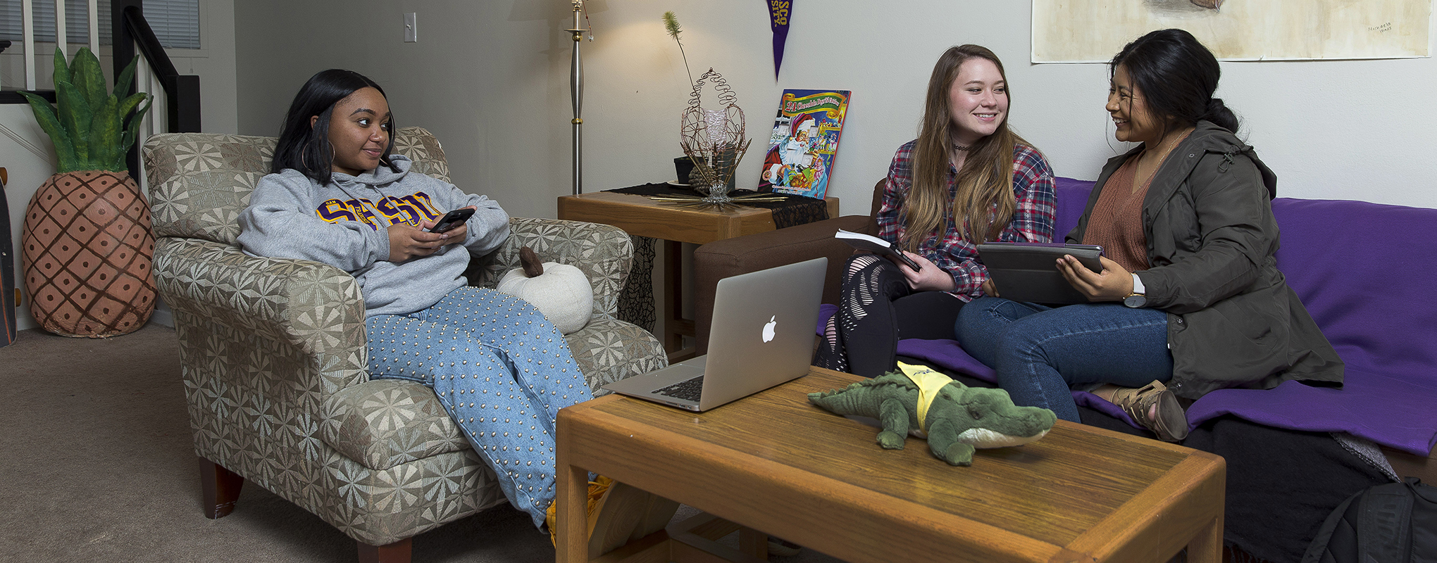 Students talking in living room