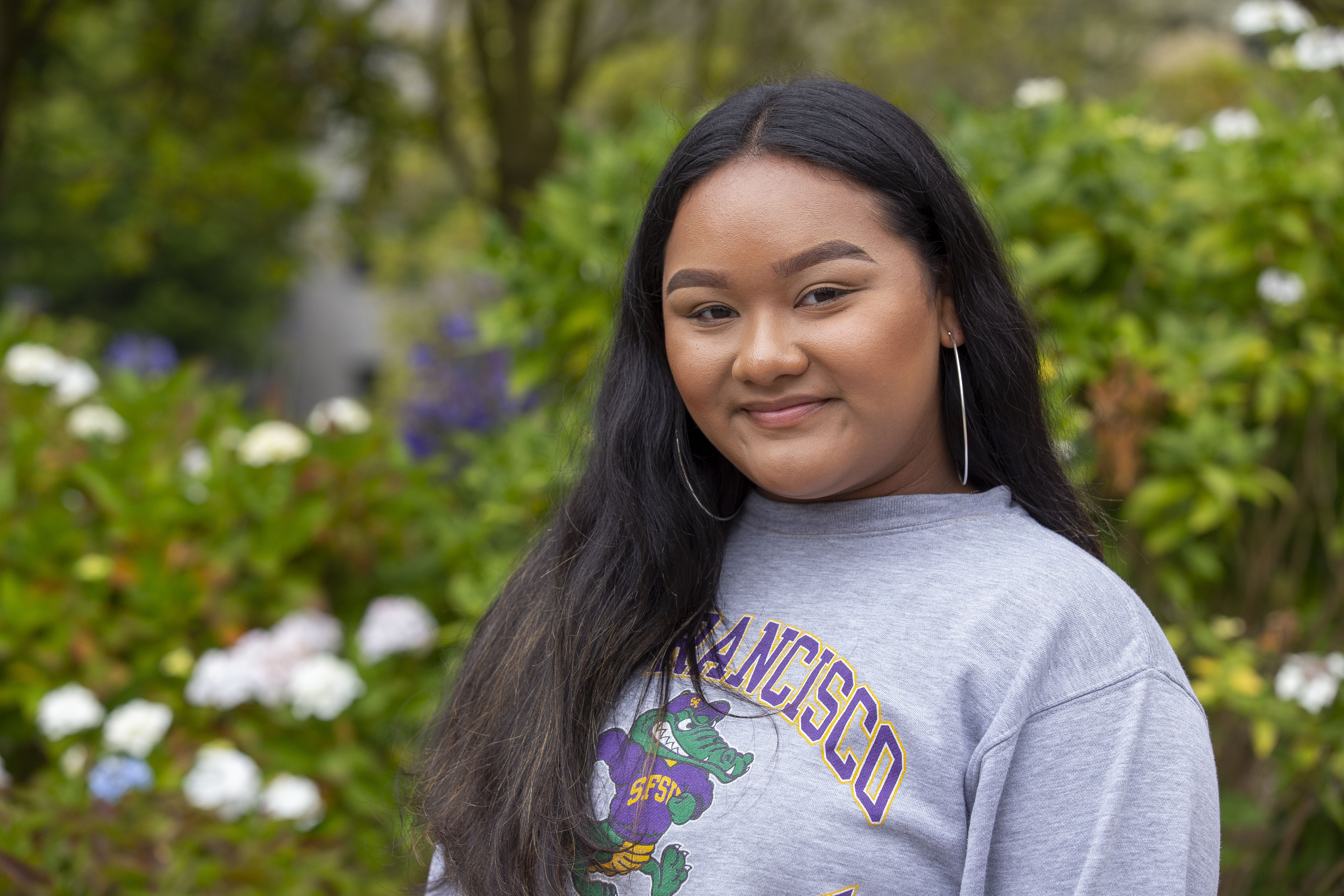 Student in SF State sweatshirt