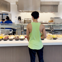 Student looking at food options at dining center