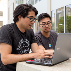 Students Looking at Computer