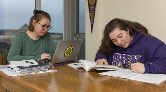 2 students studying in UPN apartment